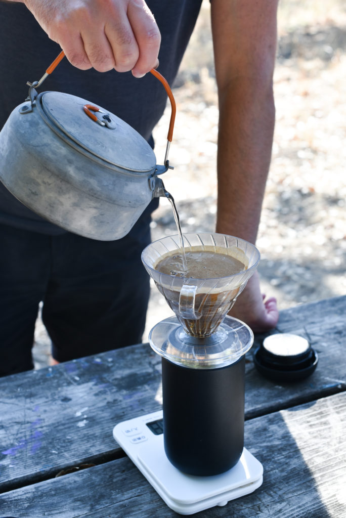 Brewing coffee at our campground outdoors using fellow coffee product